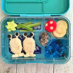yumbox lunchbox met uitgestoken boterham monsters